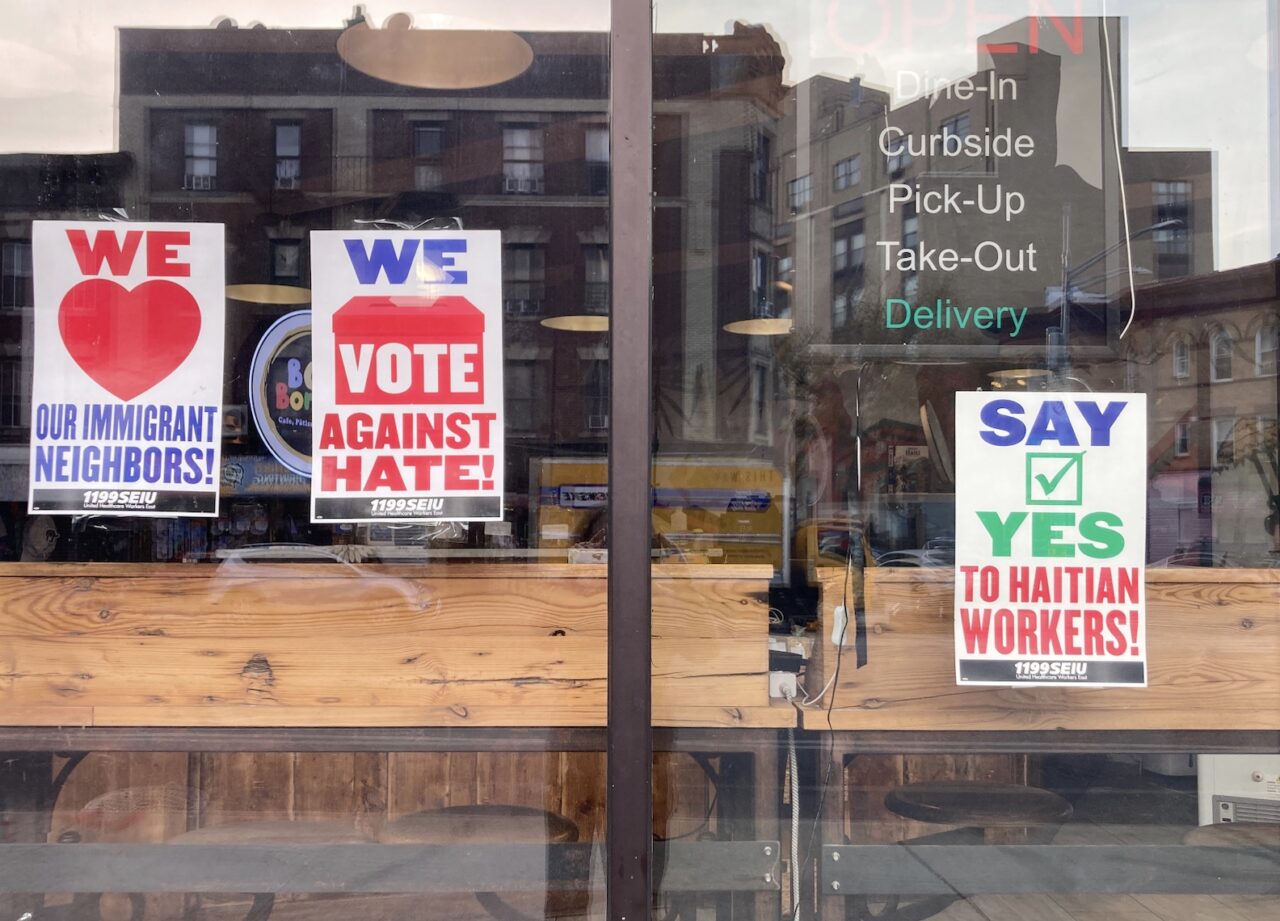 Posters encouraging the Haitian vote at Little Haiti’s Bon Bonbon restaurant. (Credit: Adrian Connor)