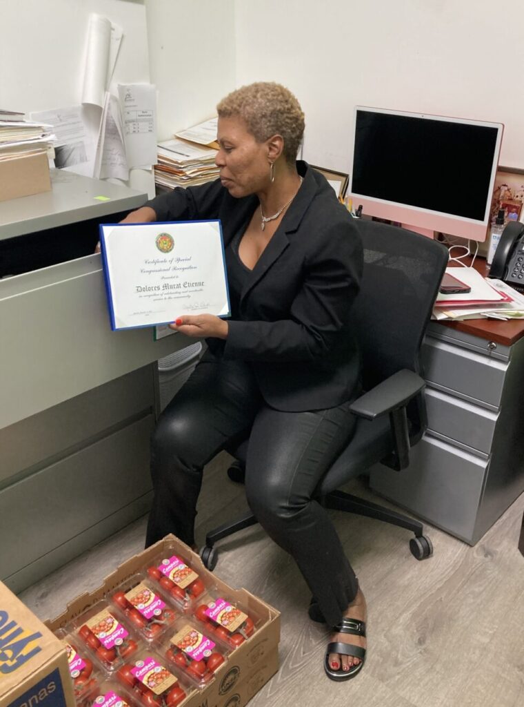 Delores Murat has won many awards for her work as director at DoDor Services, which provides Haitian immigrants with computer and language classes, references to lawyers, free groceries, and assistance with immigration documents. (Credit: Adrian Connor)